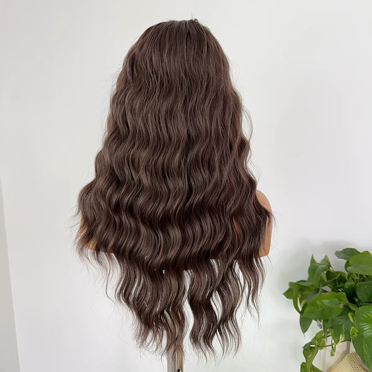 27-inch Tea-brown full-head wig with free-part styling, featuring a 13x4-inch hand-tied lace front. Curly full wig designed for women's daily wear.